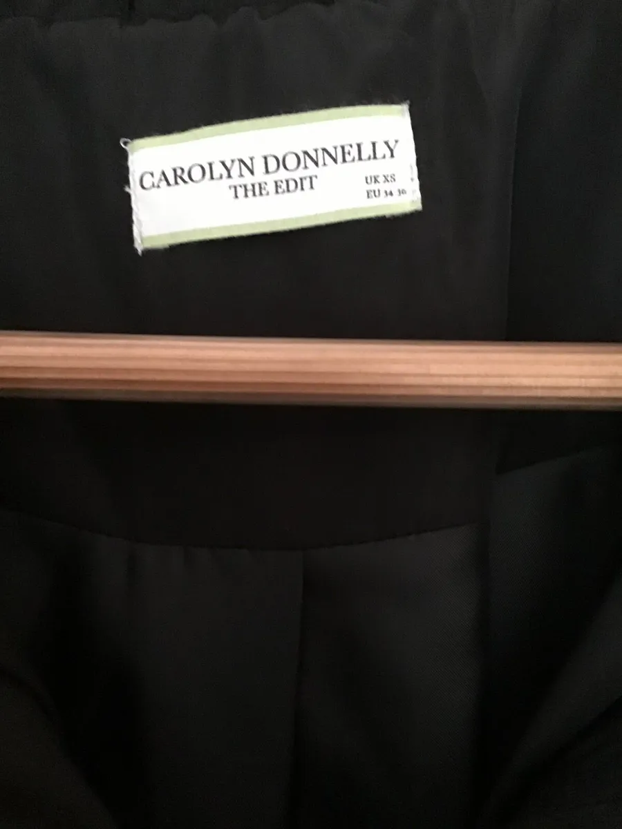 A black Carolyn Donnelly coat - Image 2