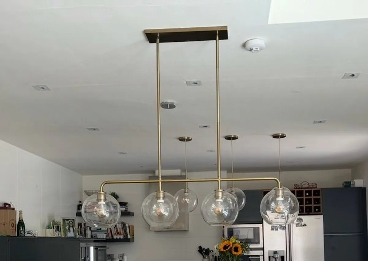 West Elm Linear chandelier with 4 glass globes - Image 1