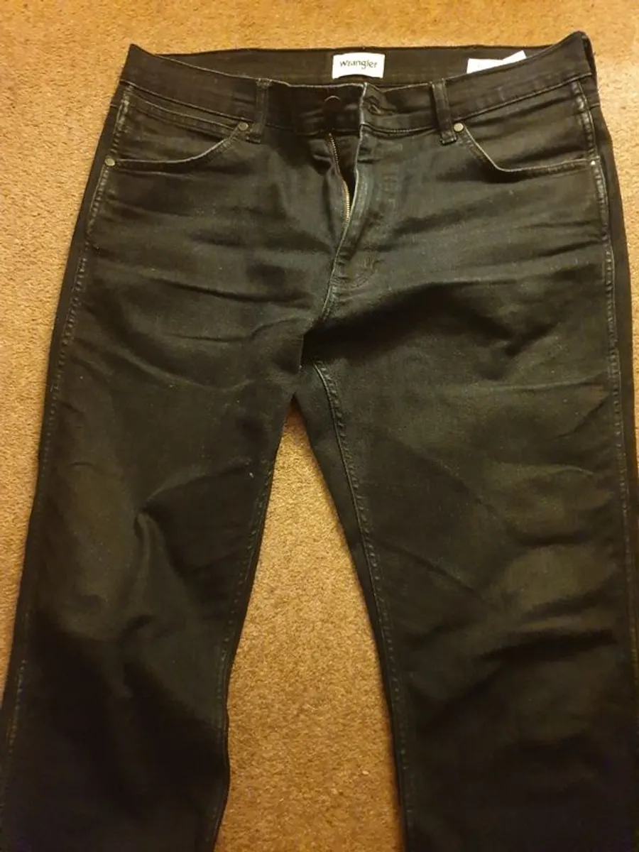 Some unworn new  clothes  and  some worn items - Image 1