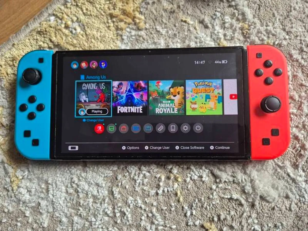 Nintendo Switch OLED with games & accessories - Image 2