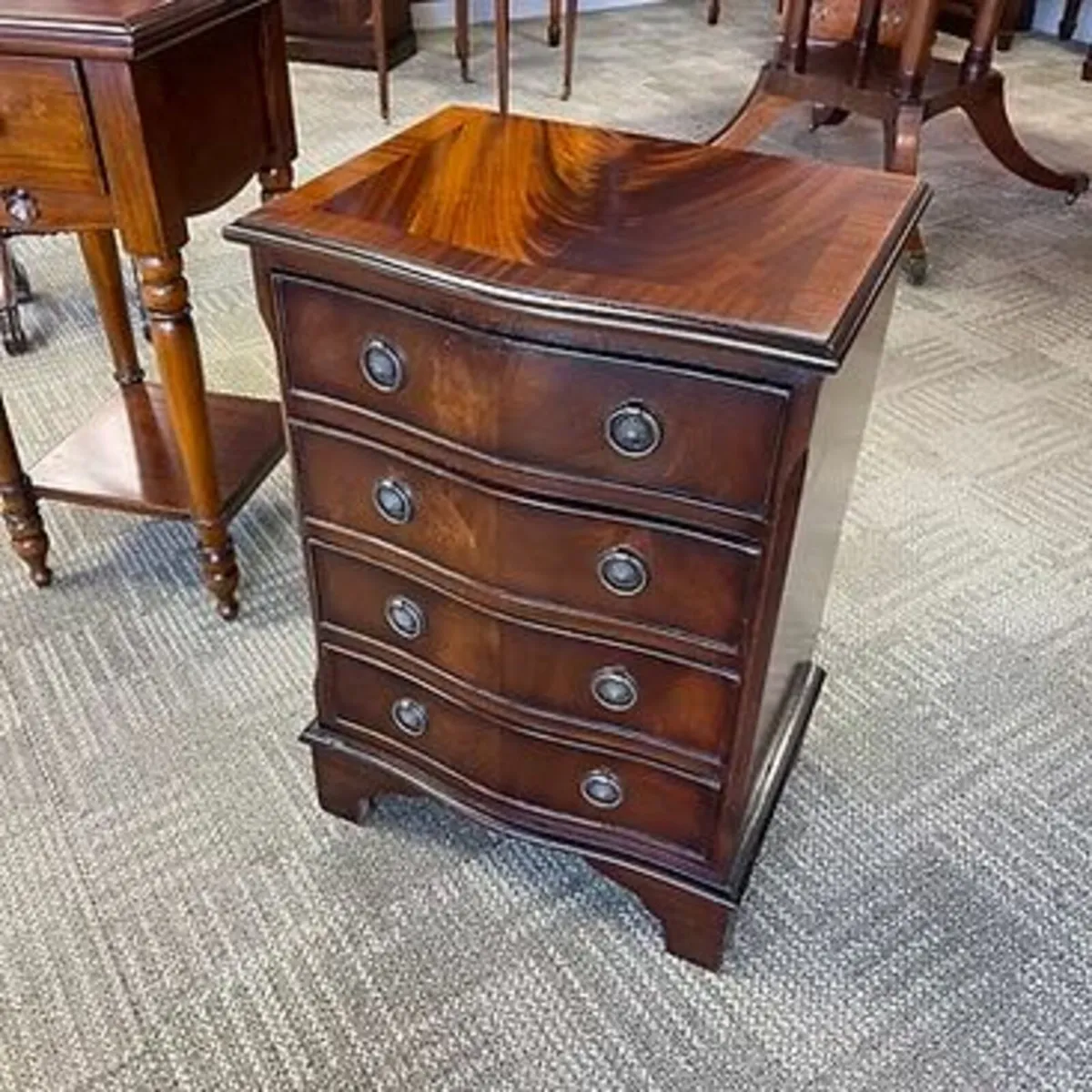 Beautiful mahogany bow front of four drawers chest