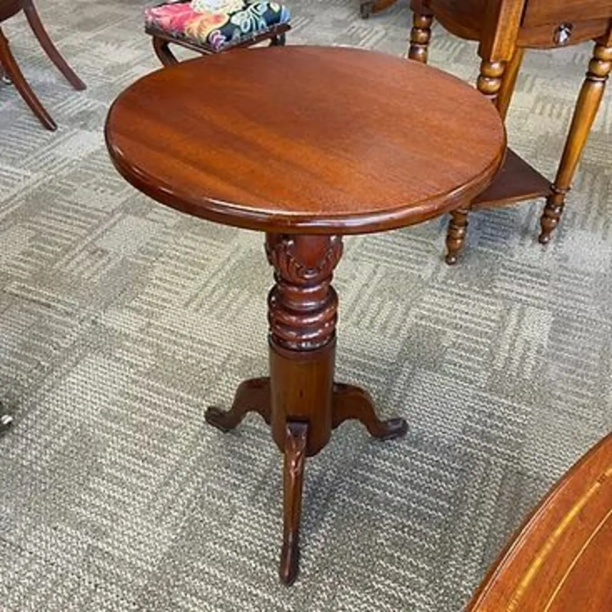 Solid mahogany round tripod occasional side table.