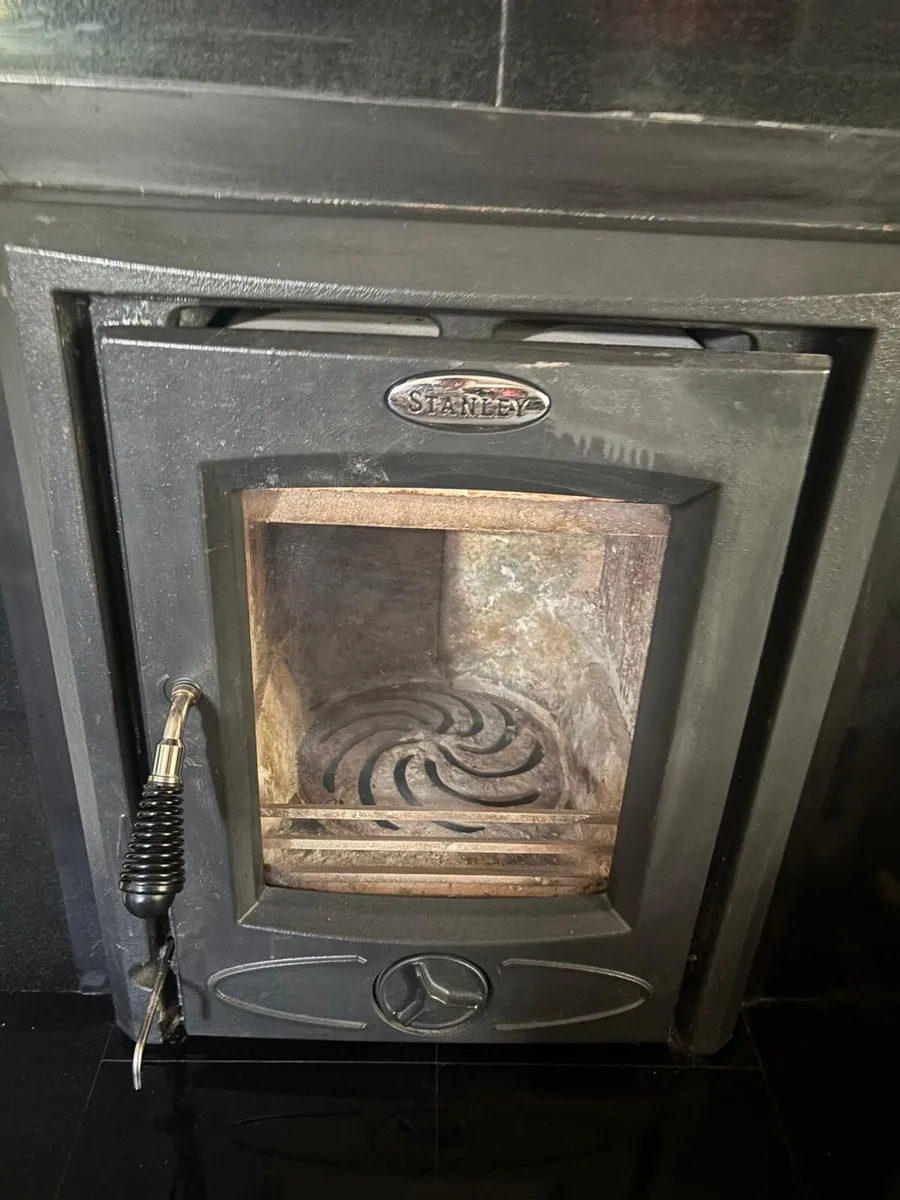 Marble fireplace and Stanley stove - Image 2