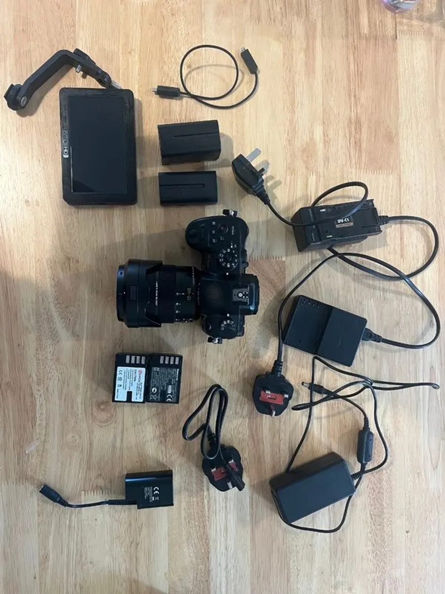 Gh5 Camera + 12- 60mm 2.8 - 4.0 lens + coupler - Image 1