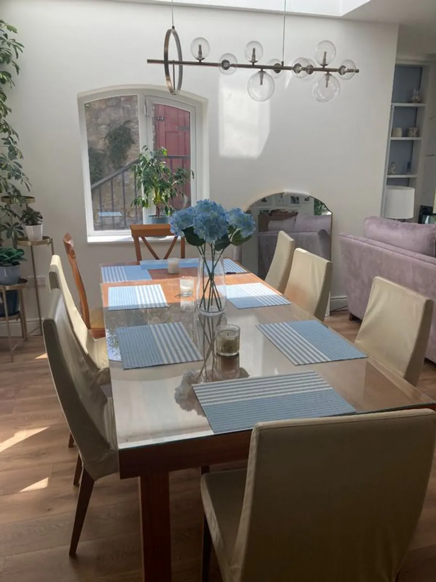 Italian Designer Calligaris Dark Solid Wood Extendable Dining table with 6 cream leather chairs - Image 1