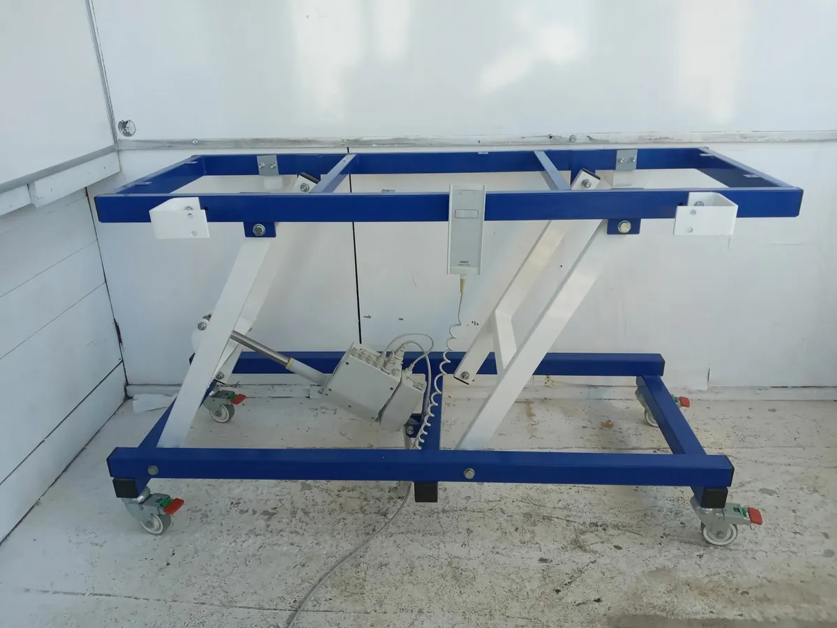 Delivery - Height Adjustable Work Bench Electric - Image 1