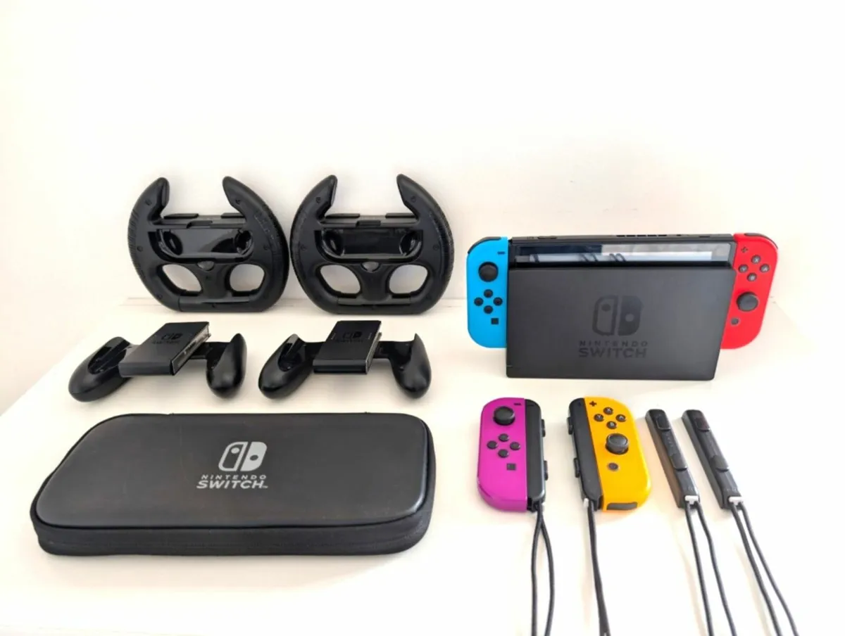 Nintendo Switch + Accessories - Image 1