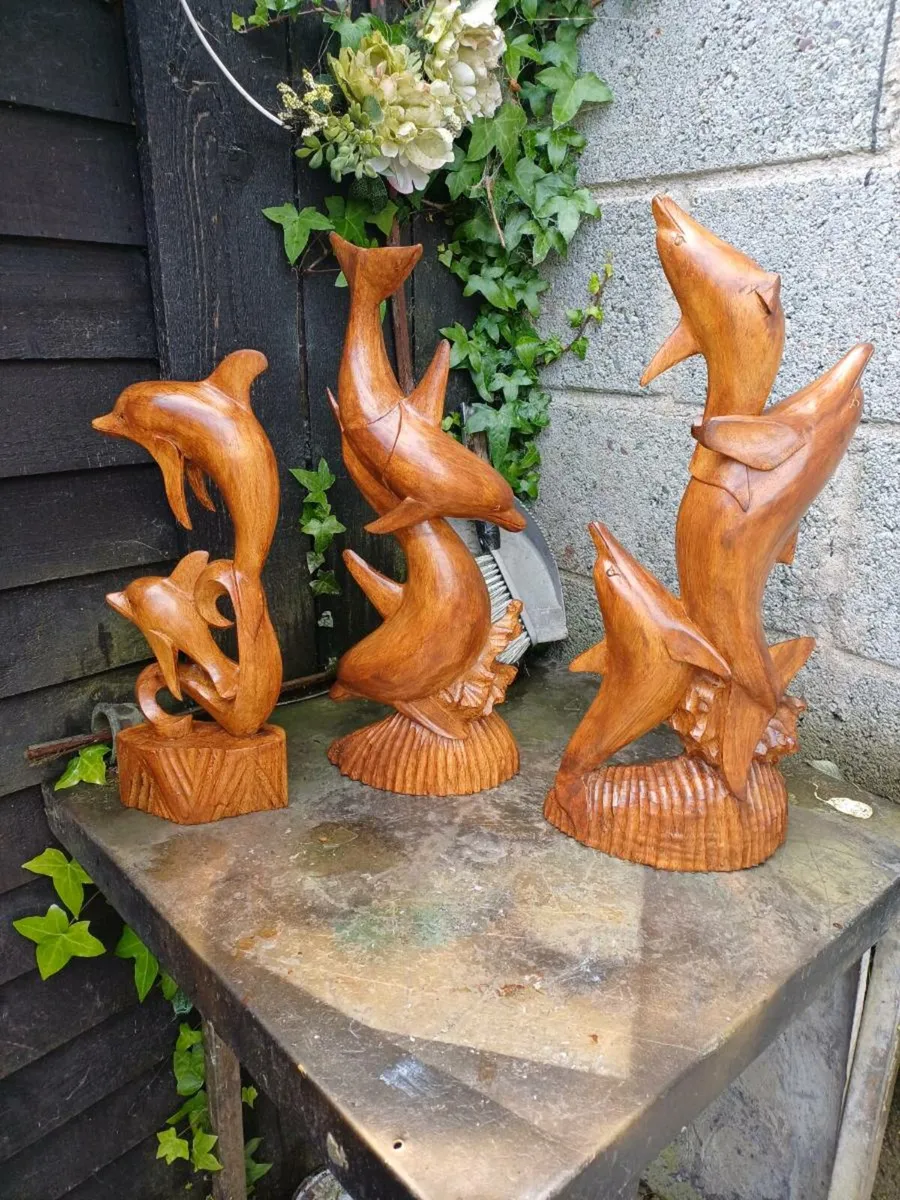Vintage Handcarved Dolphin Sculptures - Image 1