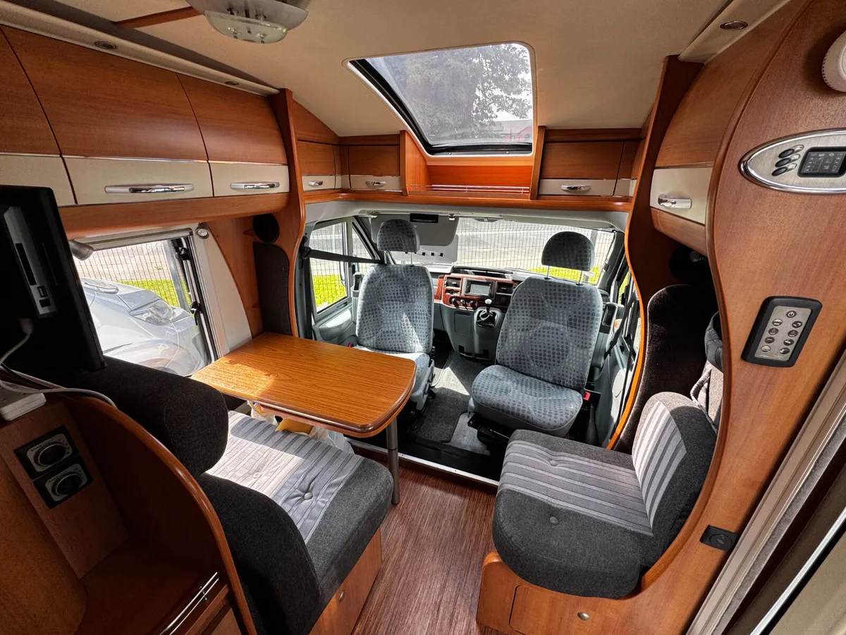 Luxury Motorhome with Fixed Single Beds - Image 2
