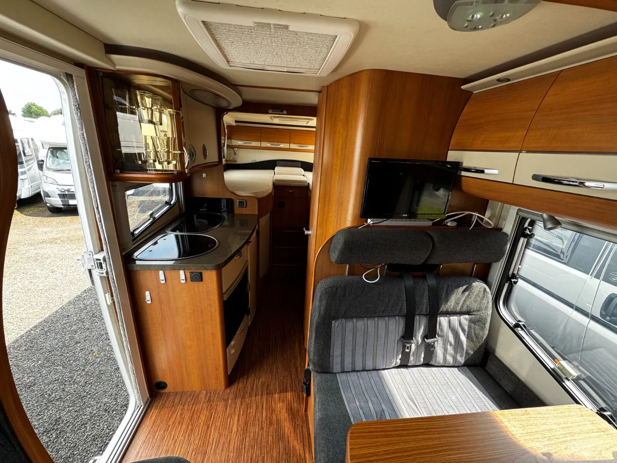 Luxury Motorhome with Fixed Single Beds - Image 3