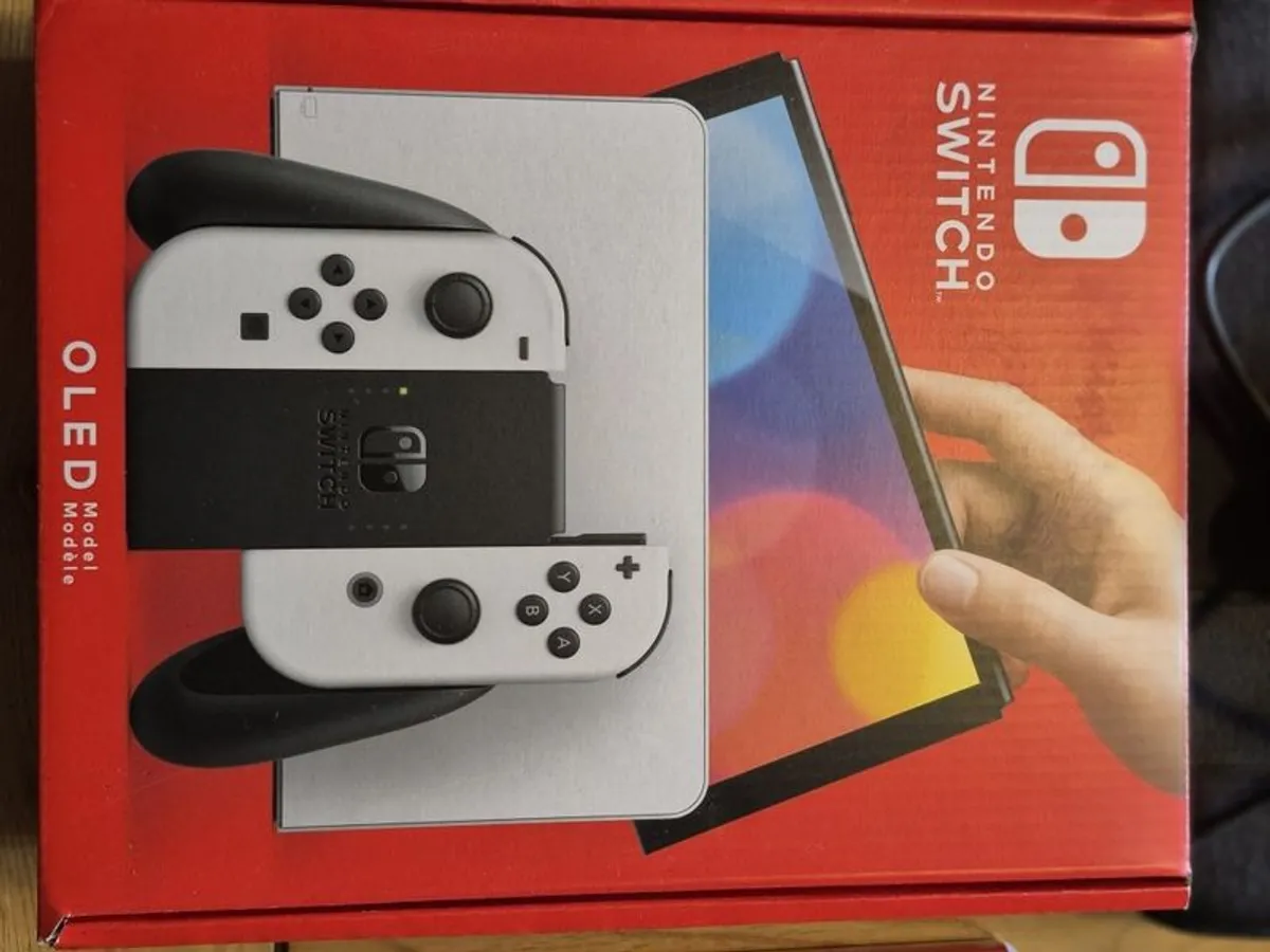 Nintendo Switch Oled plus accessories and games - Image 1