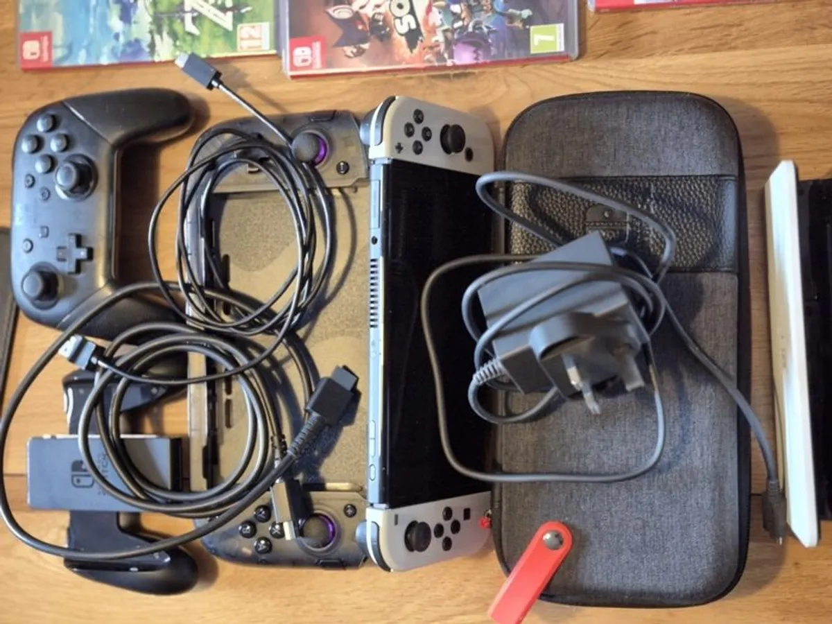 Nintendo Switch Oled plus accessories and games - Image 4