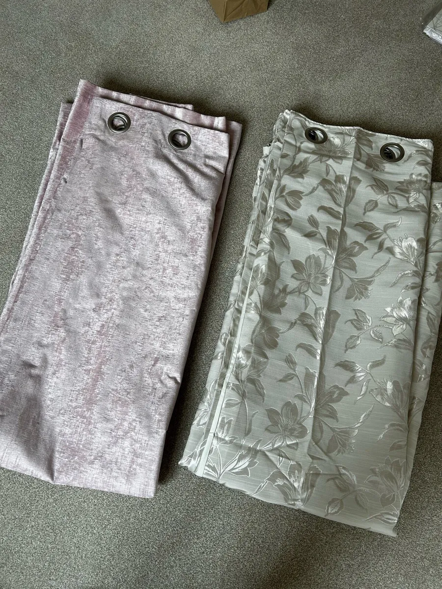 Two pairs of Fully Lined Eyelet Curtains