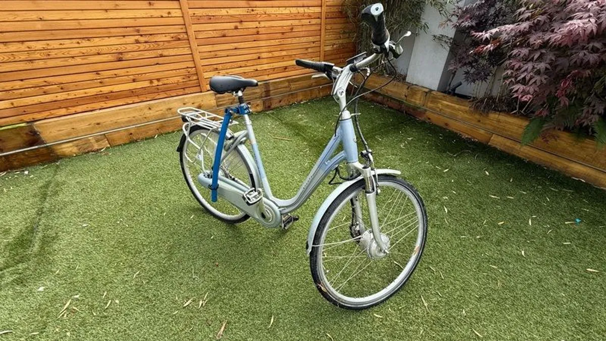 Sparta Dutch electric bike with kids bike and connector - Image 1