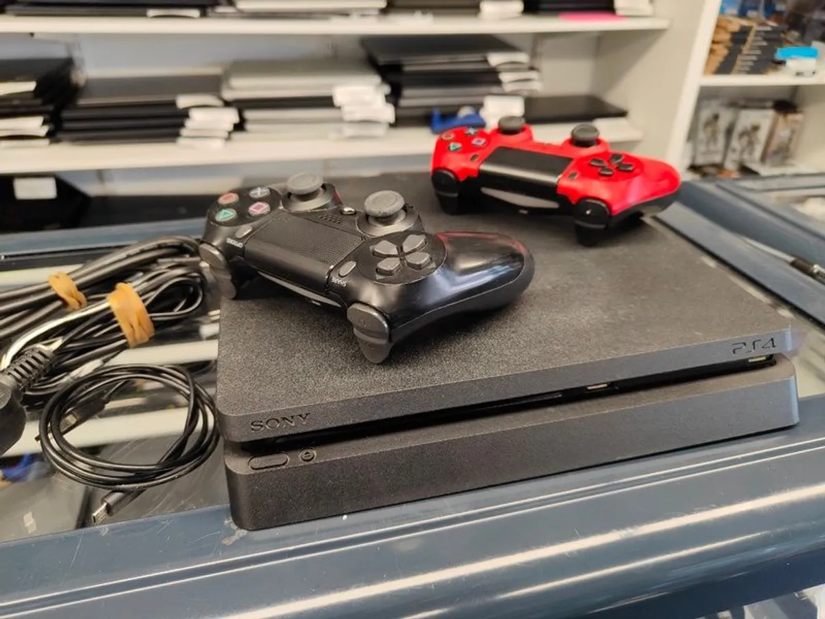 PS4 PlayStation4 Slim with Two Remote Controllers - Image 1