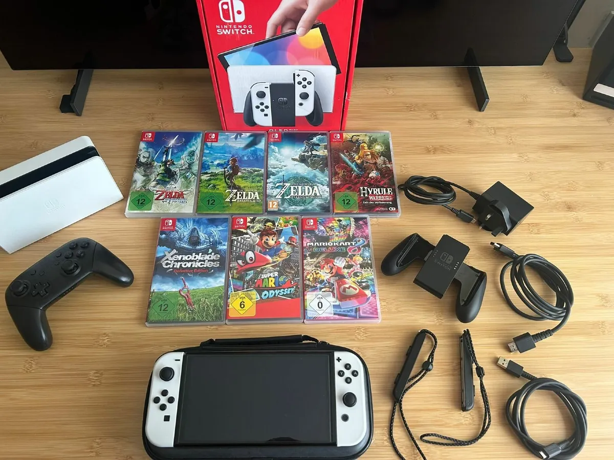 Switch OLED Bundle – 7 Games + Pro Controller - Image 1