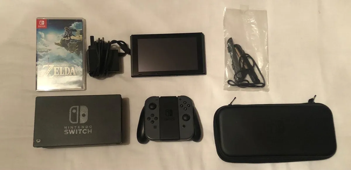 Nintendo Switch + Zelda Tears of the Kingdom - Image 1