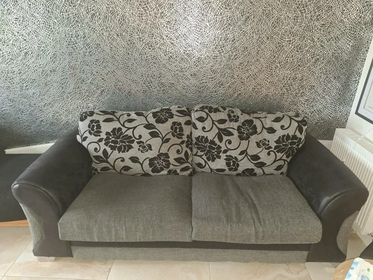 Black and grey sofa - Image 1