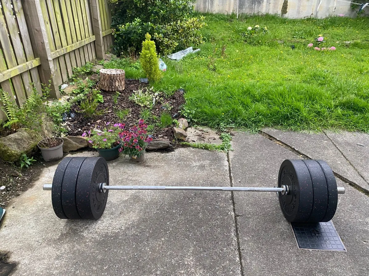 150kg Primal bumper plates and bar - Image 1