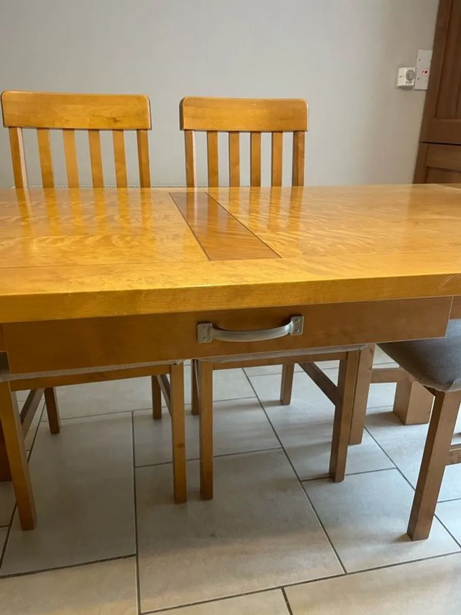 Nice pine table with storage draws, & six recently recovered chairs - Image 4