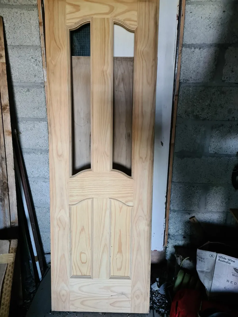 Solid new narrow cedar wood door