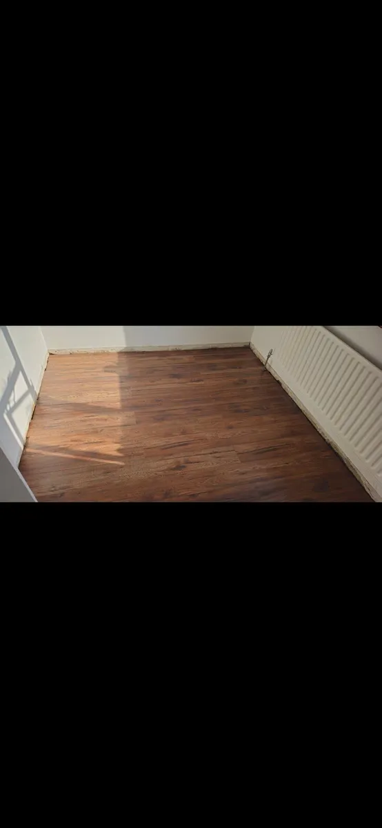 Laminate Wood Flooring - Image 1