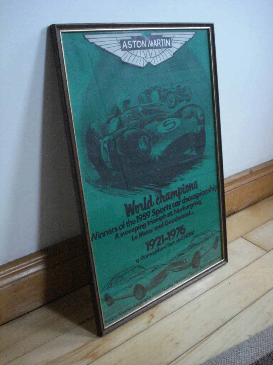 ASTON MARTIN LAGONDA FRAMED 1976 POSTER & BADGE. - Image 1
