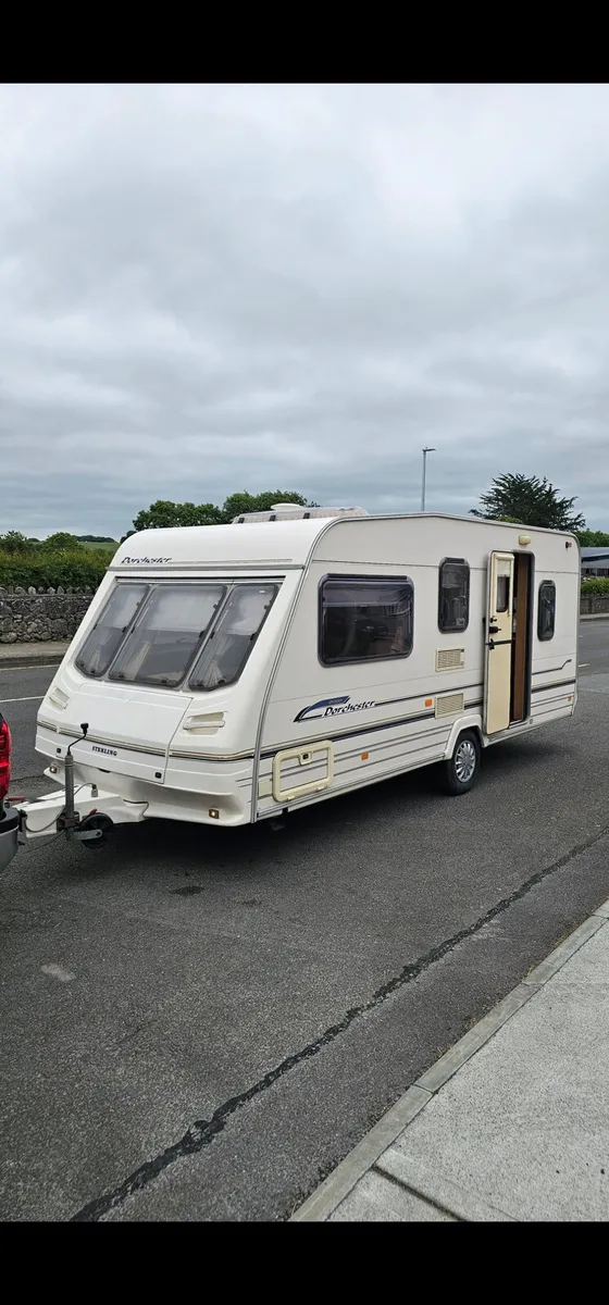 Mint Sterling caravan with full awning - Image 1