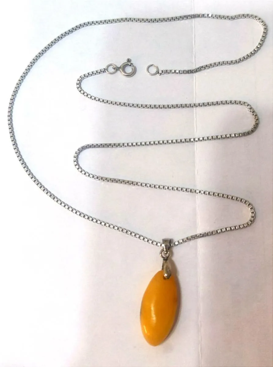 Silver necklace with amber