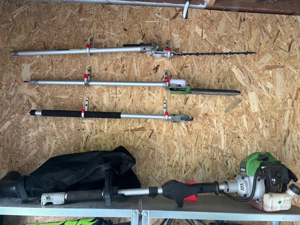 Petrol multi-trimmer with attachments