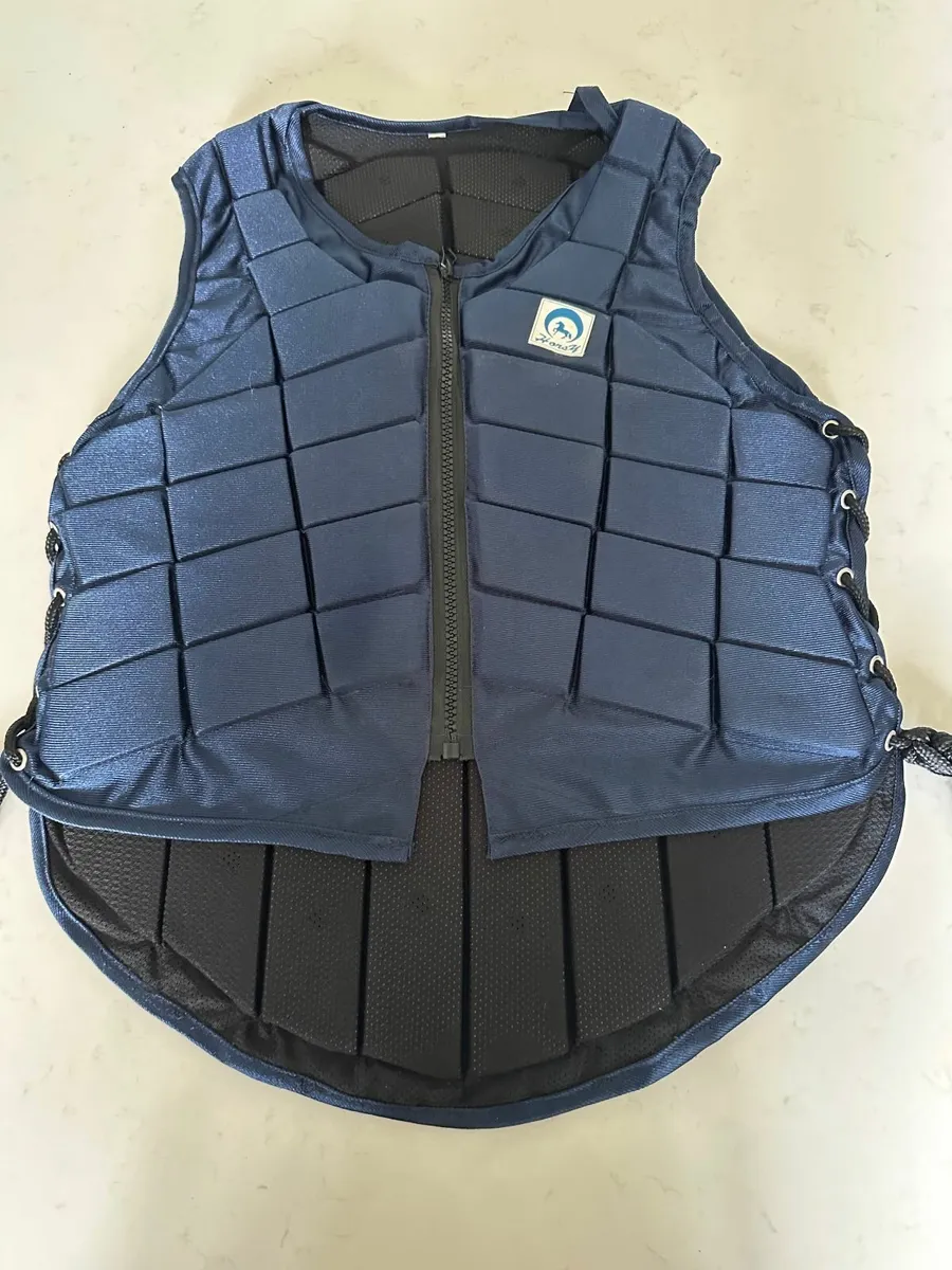Horse Riding Back Protector and Crop - Image 1