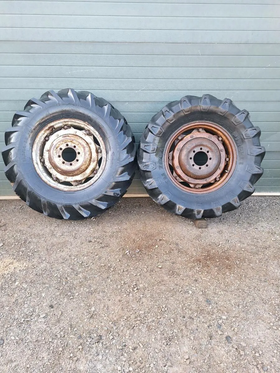 16.9 x 28 massey wheels, loader - Image 1