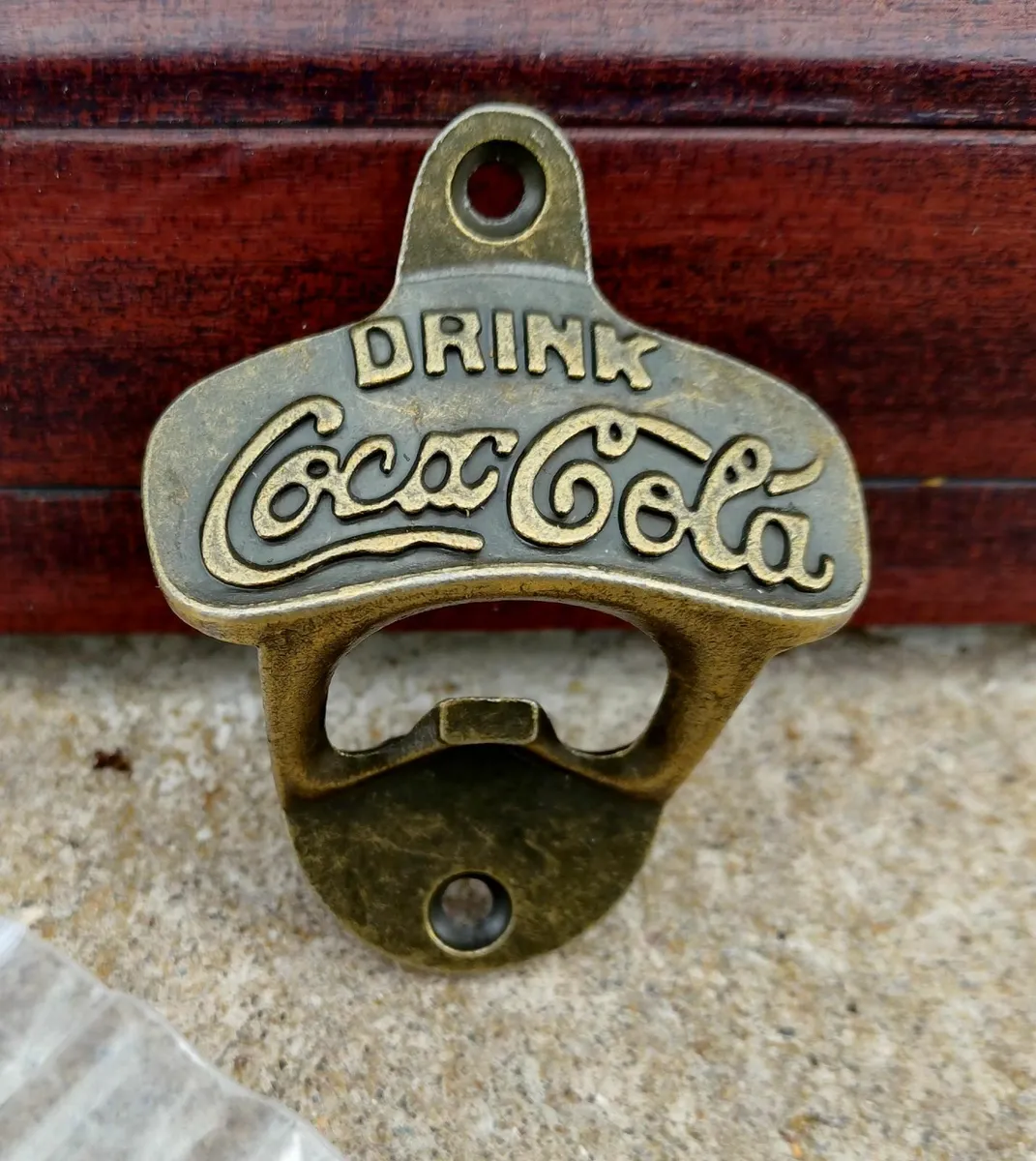 COCA COLA METAL WALL MOUNTED BOTTLE OPENER (NEW). - Image 1