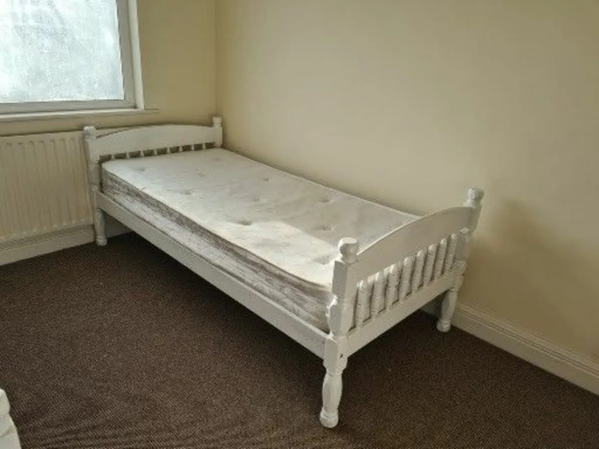 Up cycled pine bed painted white