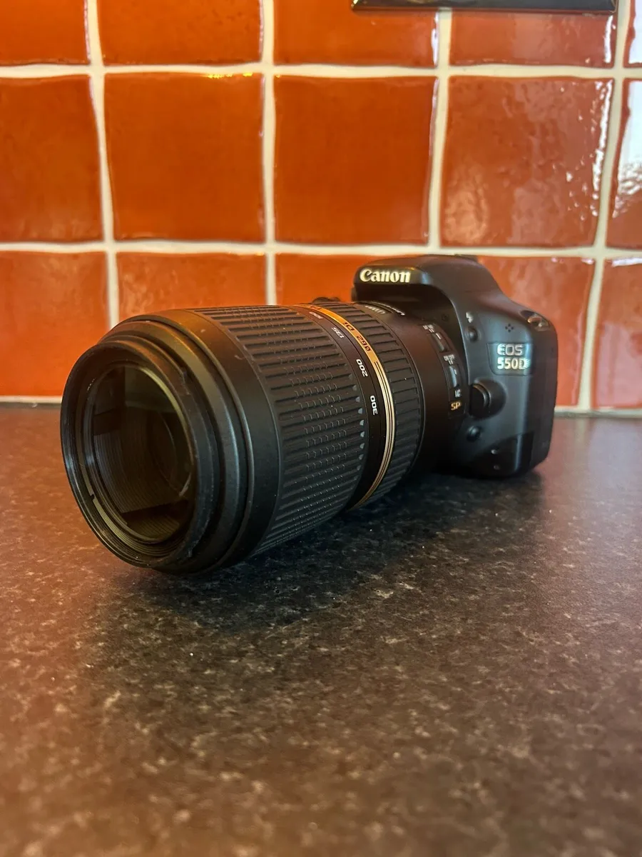 Canon camera + telephoto lens - Image 1