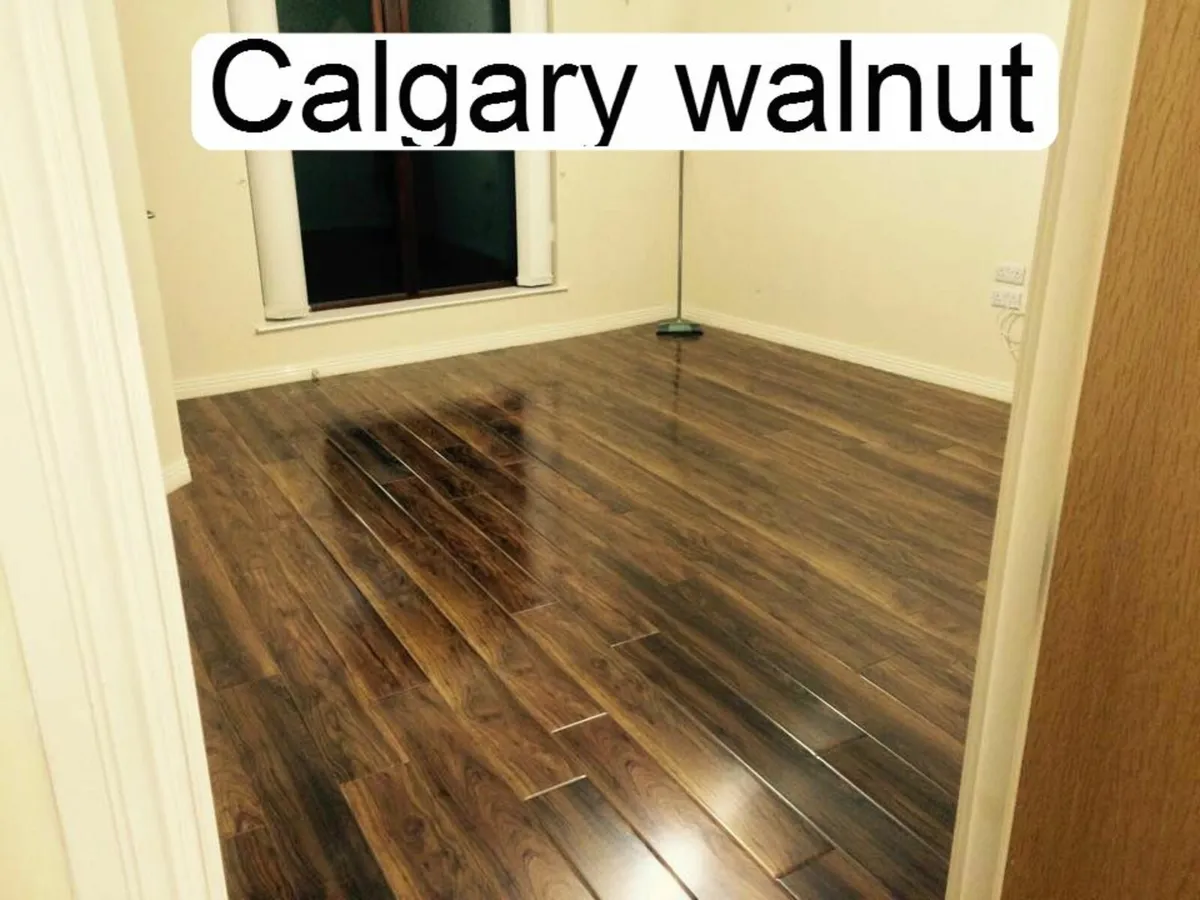 Budget 12mm High Gloss Laminated Click Flooring - - Image 3