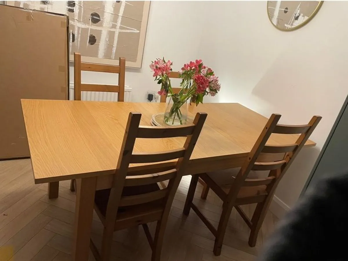 IKEA dining table and four chairs - Image 1