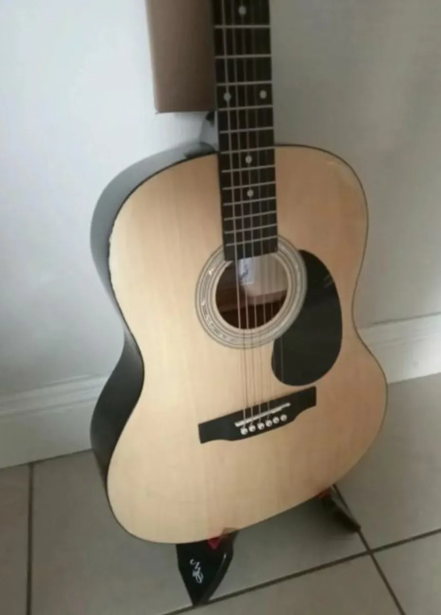 Acoustic Guitar with Bag, Stand, Tuner and Strings - Image 1