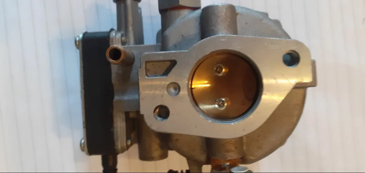 Carburettor for twin engine ride on mower 20HP - Image 1