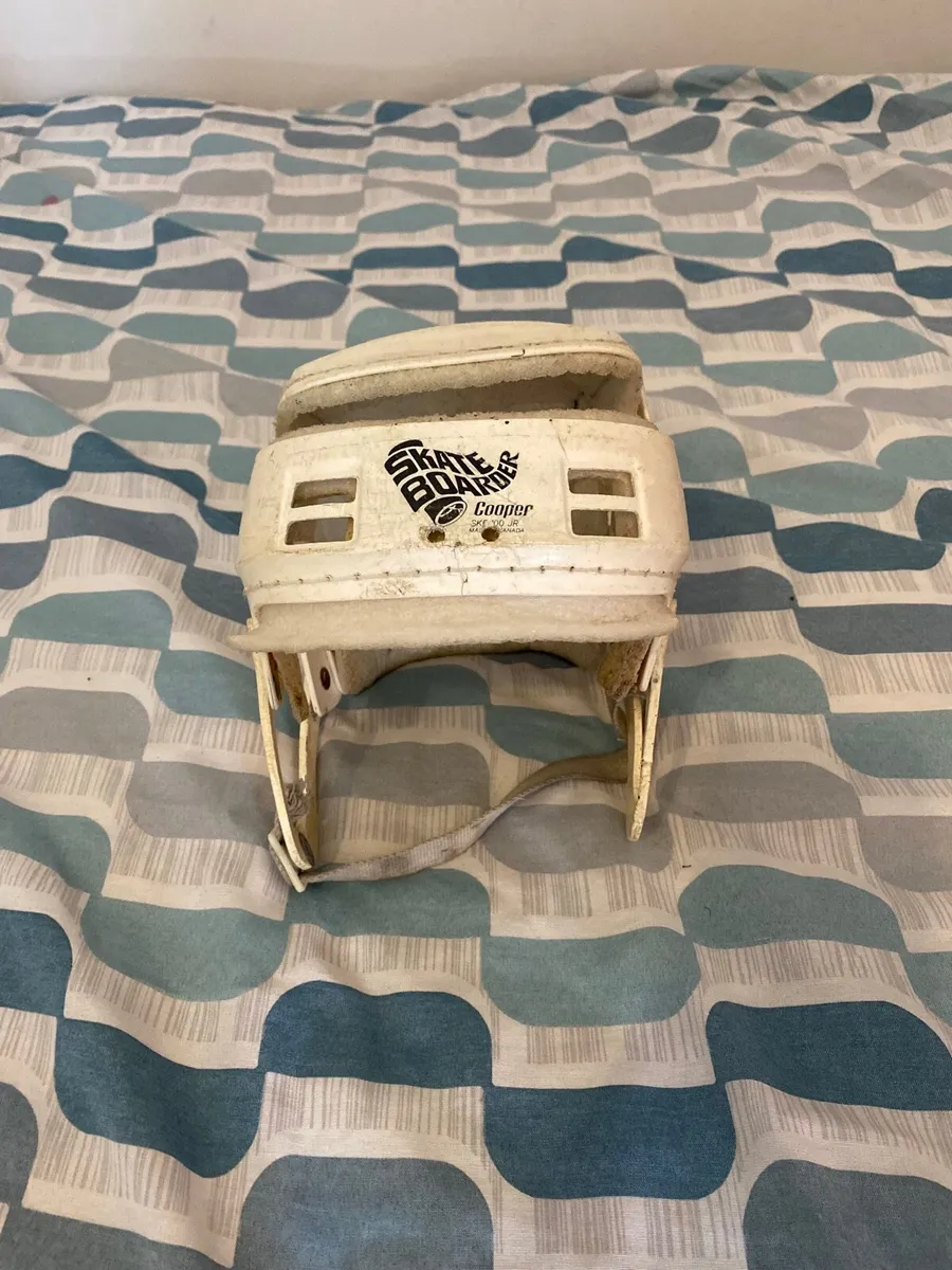 White skate boarder helmet