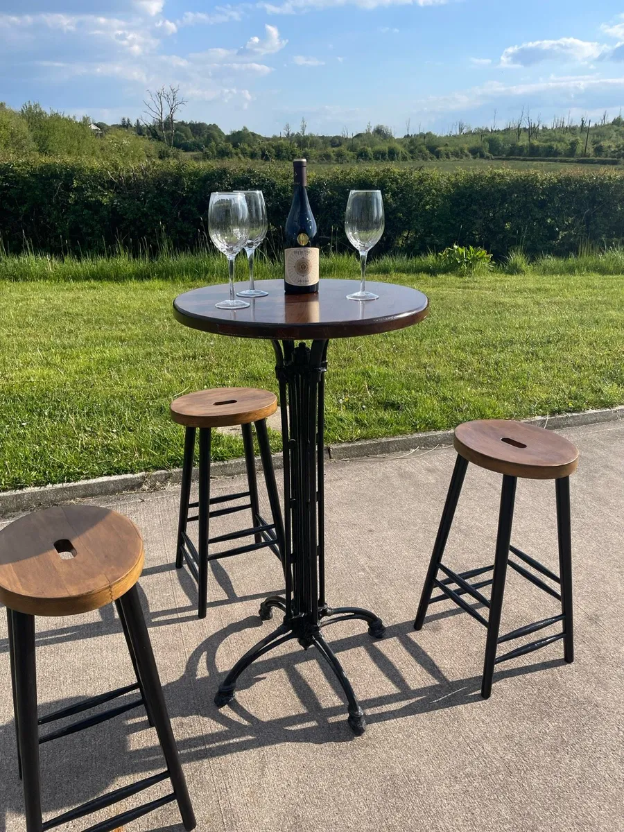 Cast iron tall wine table and oak stools - Image 1