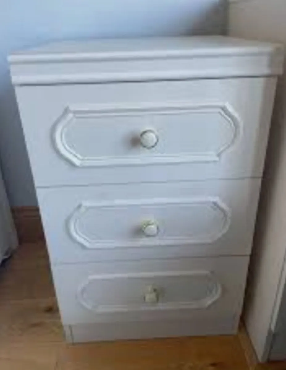 Matching pair white bed side lockers