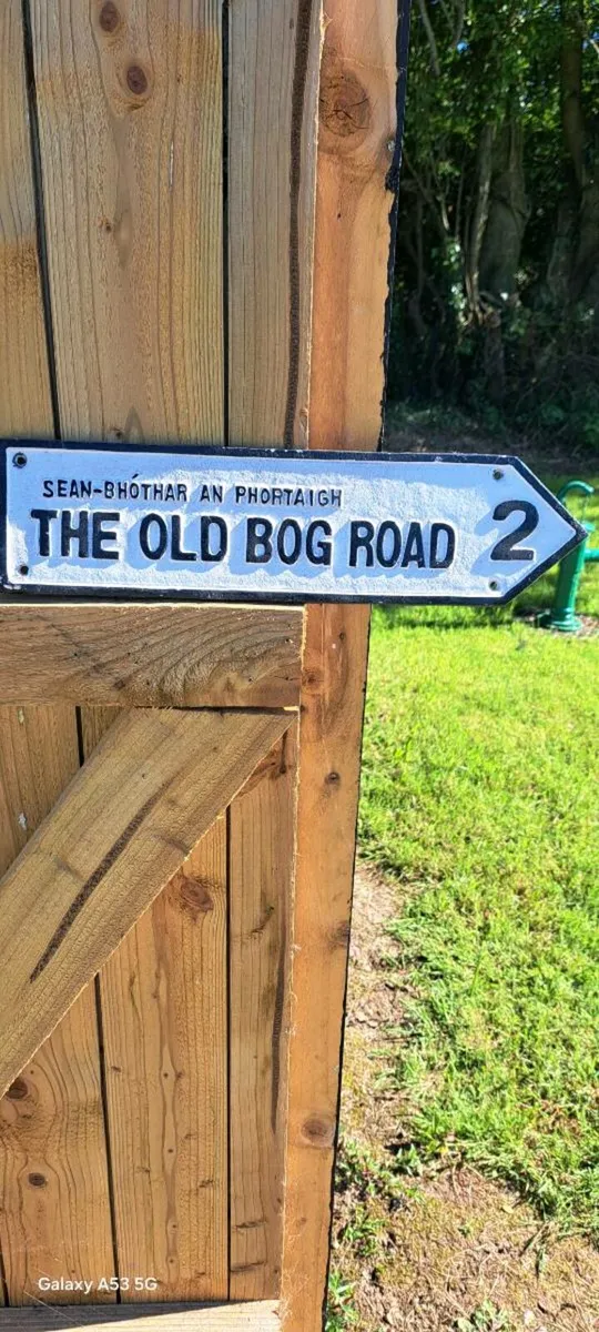The old bog road cast iron sign
