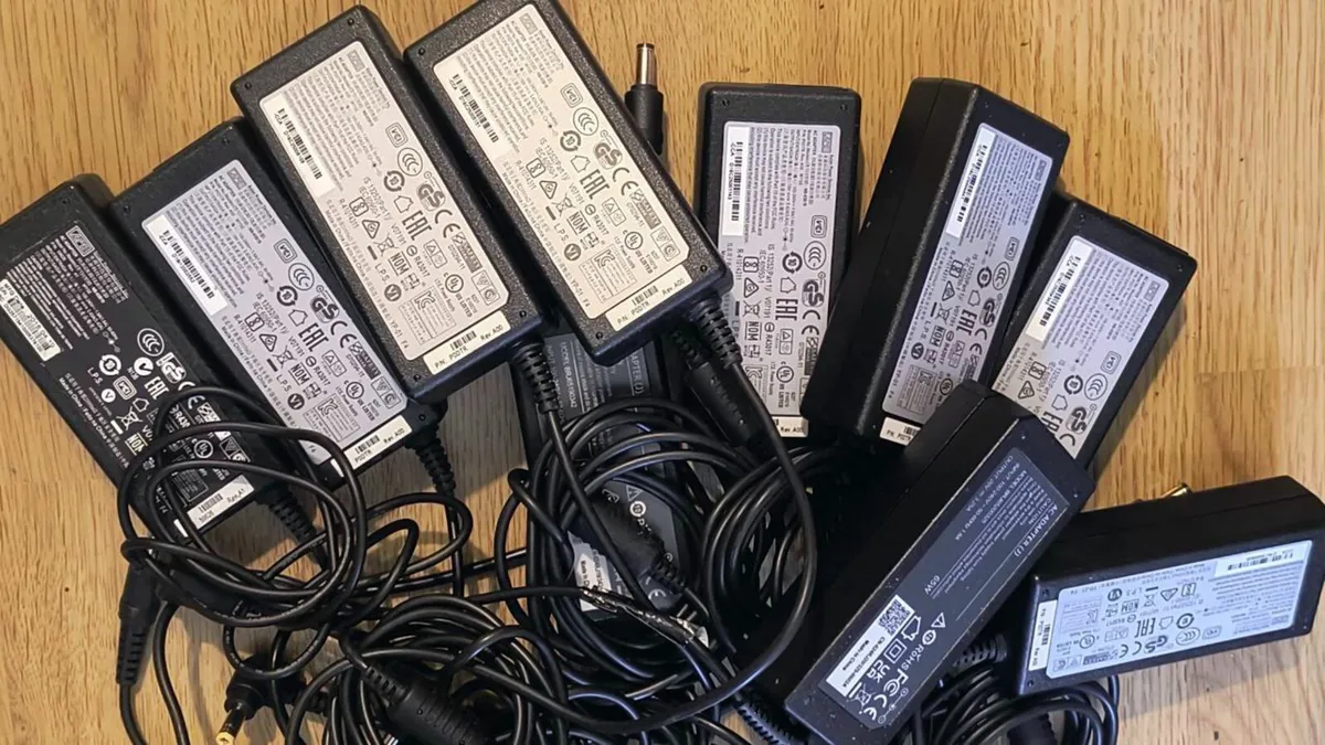 Laptop Battery Adapter AC Chargers NB-65B19. Power - Image 1