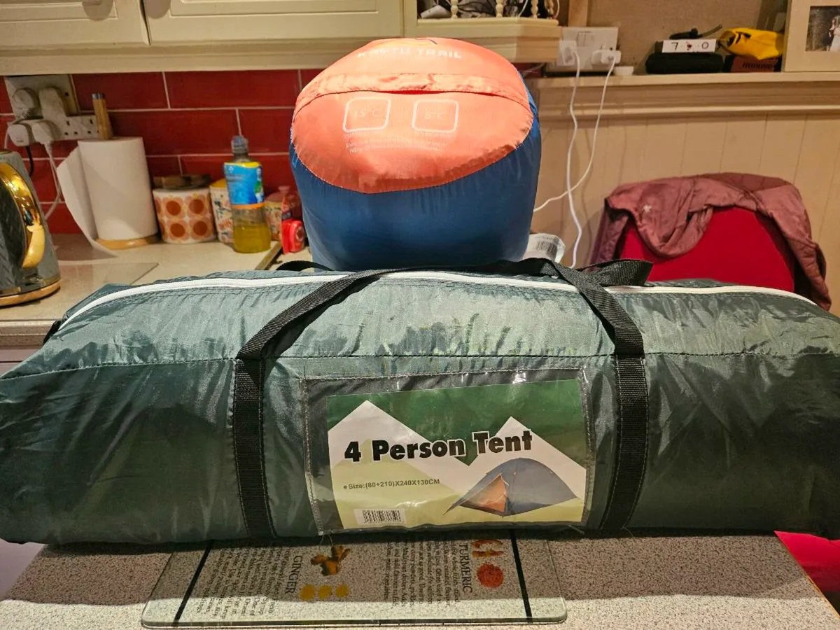 New 4 man tent plus sleeping  bag