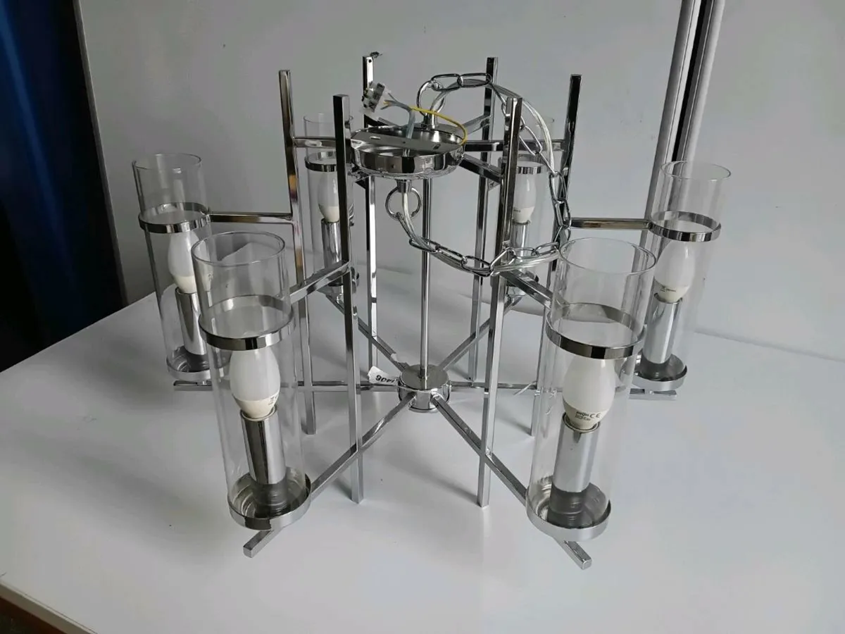 Chrome 6 Light Shaded Chandelier

X1 - Image 3