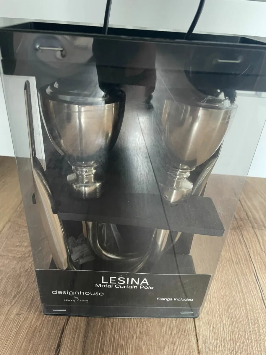 Lesina metal curtain hold backs