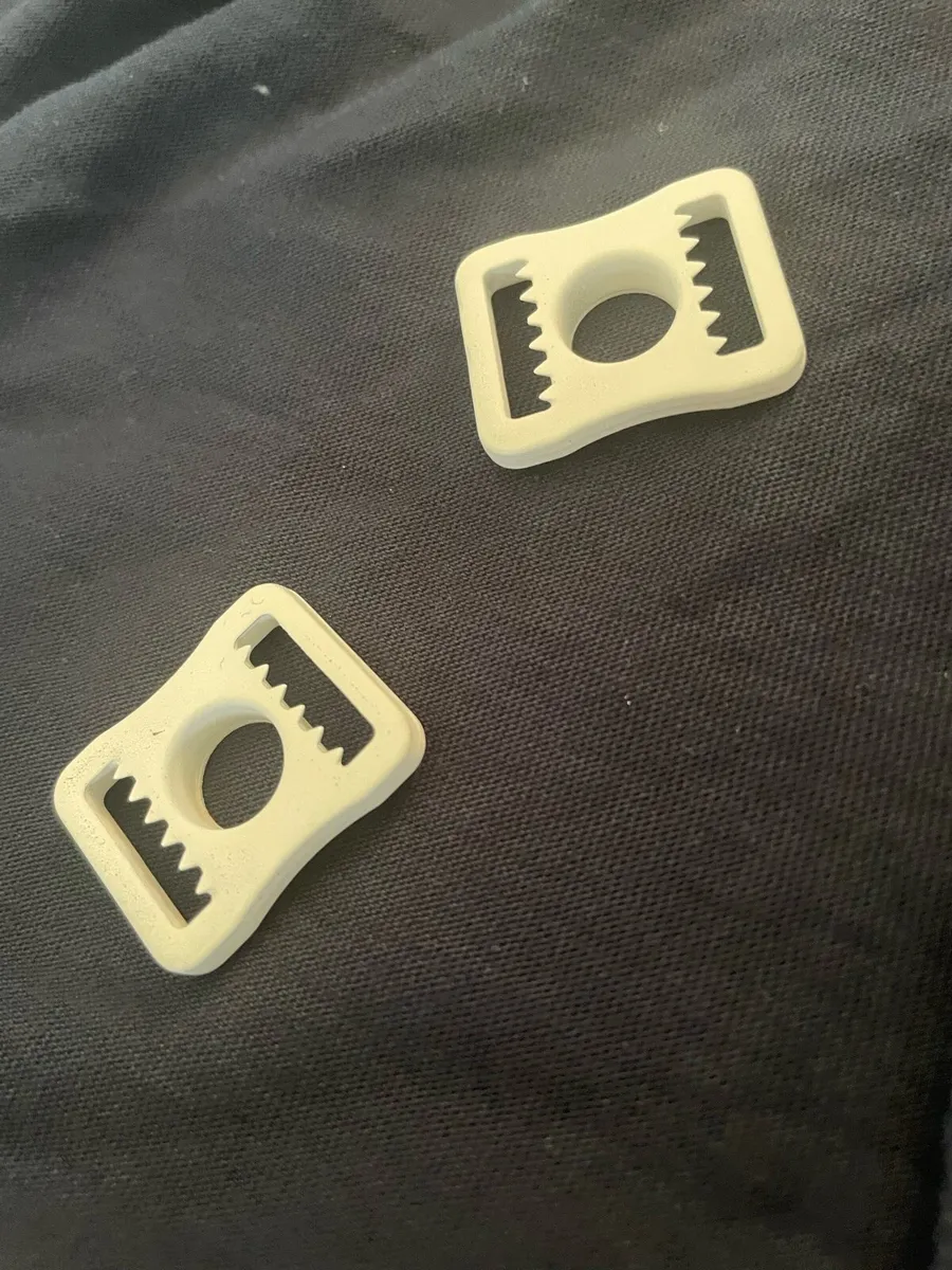 White helmet clips