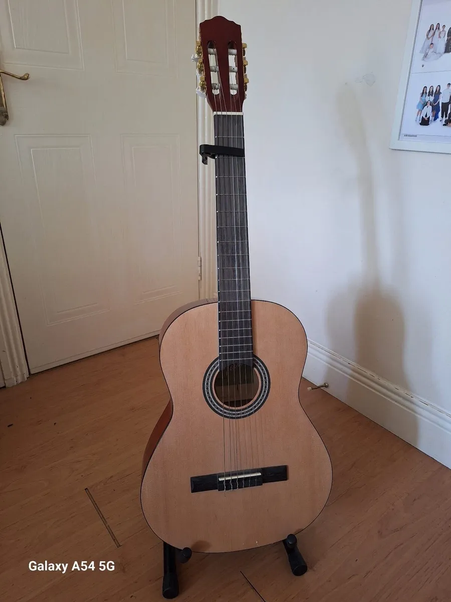 Acoustic Guitar - Image 1