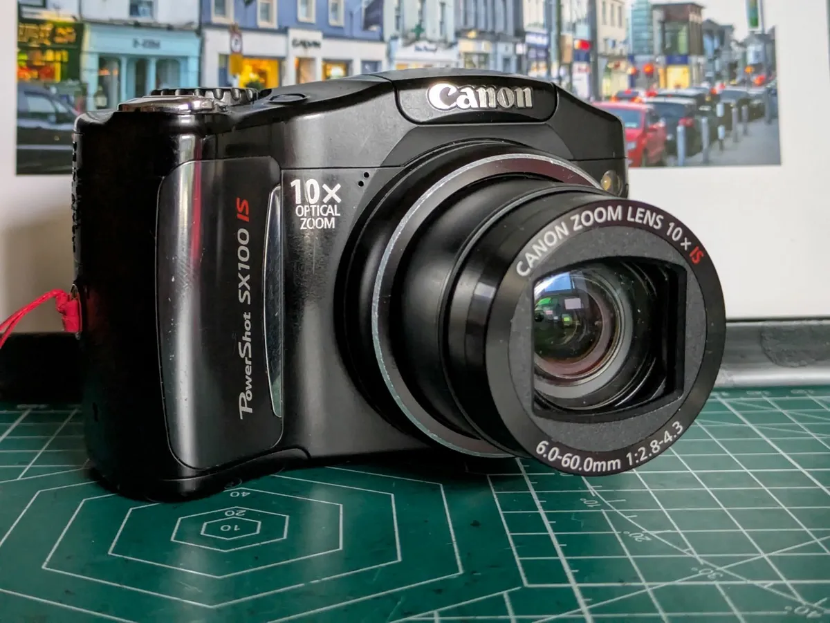 Canon PowerShot SX100 IS 8MP CCD 🌈 digital camera - Image 1